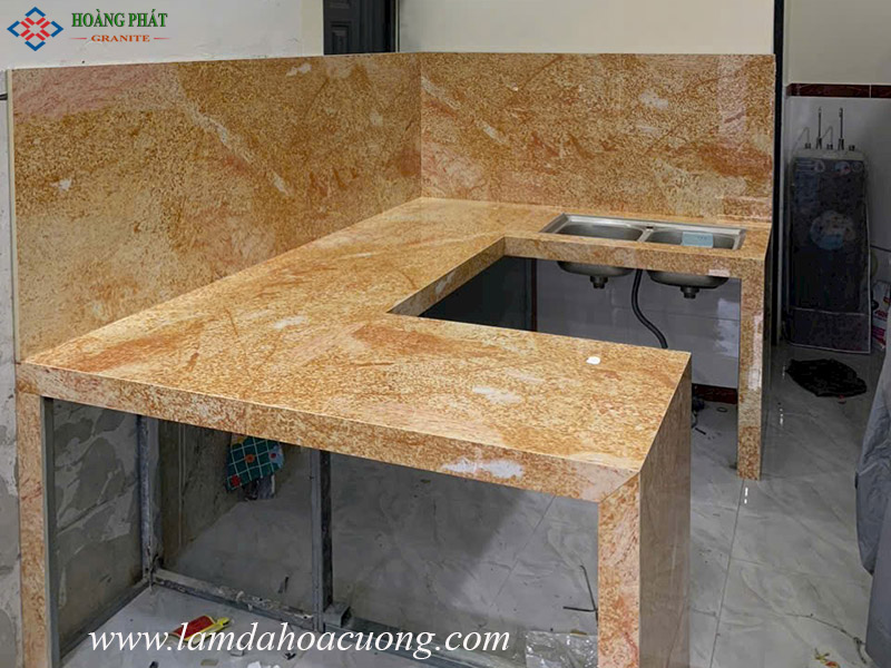 Mẫu đá hoa cương mặt bếp màu vàng chất lượng